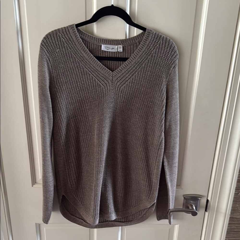 RD Style Josslyn V Neck Sweater is a cozy addition to your everyday wardrobe.